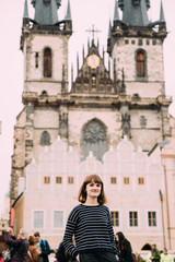 Fototapeta na wymiar Prague, Czech Republic. Young Caucasian Woman Posing On Background