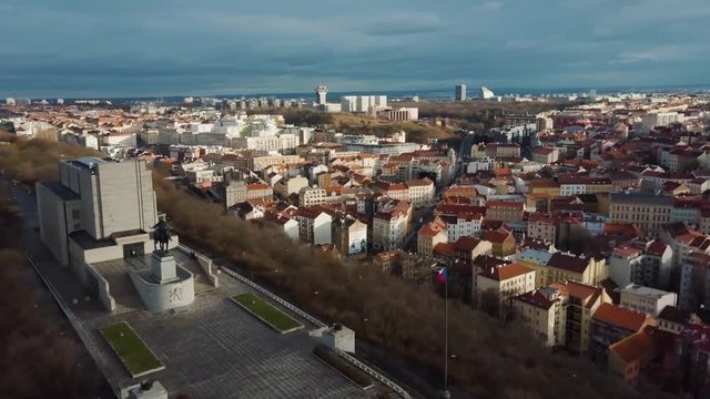 Dramatic Drone Reveal of Vitkov Hill and Prague with Fluttering Czech Flag
