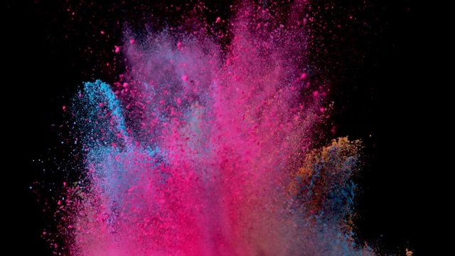 Super slow motion of coloured powder explosion isolated on black background. Filmed on high speed cinema camera Phantom VEO 4k, 1000fps.