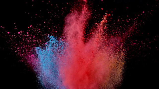 Super slow motion of colored powder explosion isolated on black background. Filmed on high speed camera, 1000 fps.