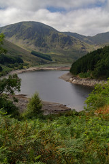 Obraz na płótnie Canvas Low Water level at Haweswater reservoir reveals the remains of the village of Mardlae Green in summer 2018