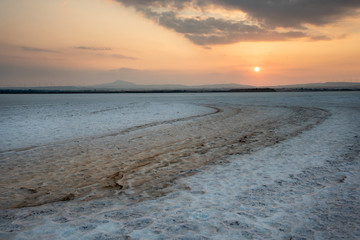 Sunset over the empty dry salt lake of Larnaca in Cyprus