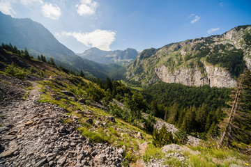 Fototapeta na wymiar Hiking trail high in the mountain in summer.