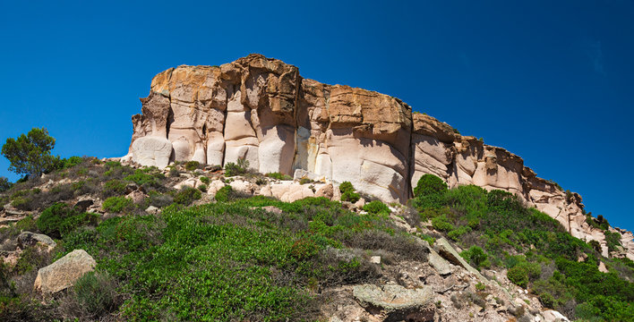 "Il Pulpito" is a rock castle that overlooks the Mediterranean scrubland on the island of San Pietro, in Sardinia, Italy.