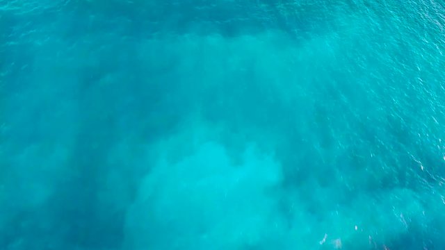 Aerial survey from a drone over the surface of the ocean