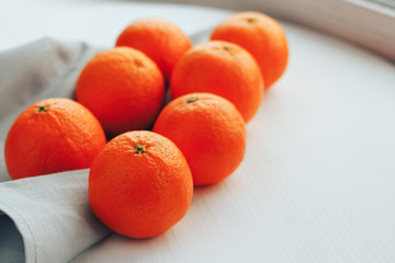 Bright Orange Mandarin on white background