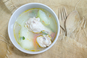 Soup with chicken droumstick.