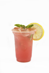 Strawberry lemonade with lemon and mint on white background