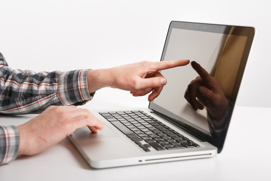 Laptop with man hand isolated