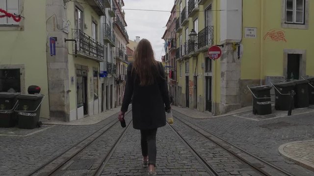 Girl walking in front of the camera