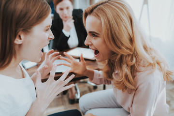 Mother and Young Daughter in Psychologist Office.