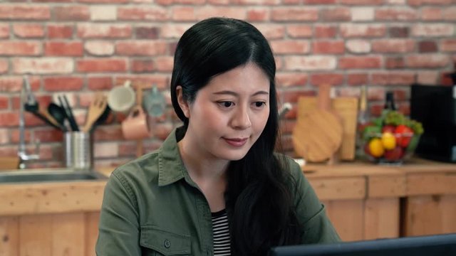 CloseUp view of a woman staring computer.