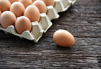 Chicken Egg in egg box on wooden table