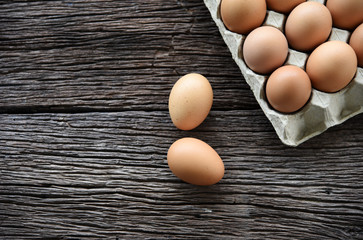 Chicken Egg in egg box on wooden table