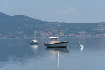 Boats floating on a lake