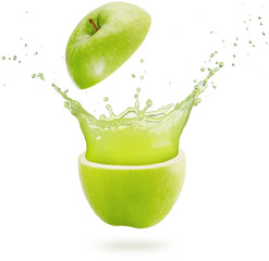 fresh juice splashing out of a green apple isolated on white background