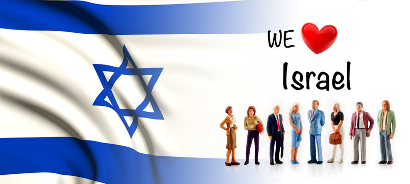 we love Israel, A group of people pose next to the Israeli flag
