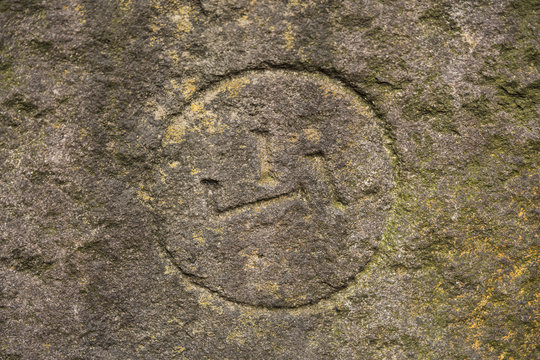 Kanji meaning mountain on one of the wall stones of Koishikawa Korakuen Park in Tokyo.