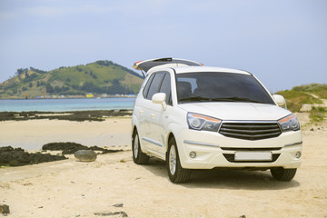 Fototapeta na wymiar Car rent on a beach on Jejy Island in Korea