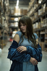 Fototapeta premium Dramatic portrait of a girl theme at the dark