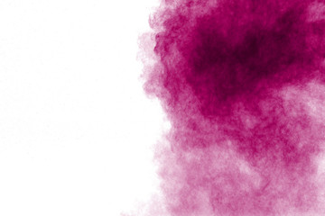 Pink powder explosion isolated on white background.