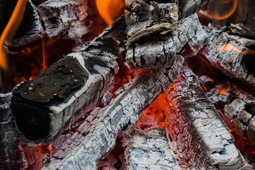 burning wood in a brazier, mangal or bbq