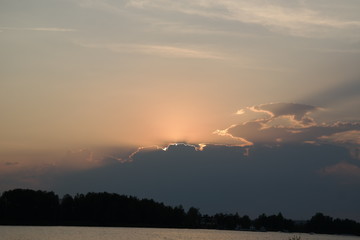 beautiful sunset after wonderful summerday at the lakeside