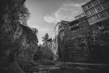 Old sulfur Baths in Abanotubani district with wooden carved balconies in the Old Town of Tbilisi Georgia.