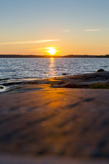 Silent moment on the shores. Sunset on the sea.