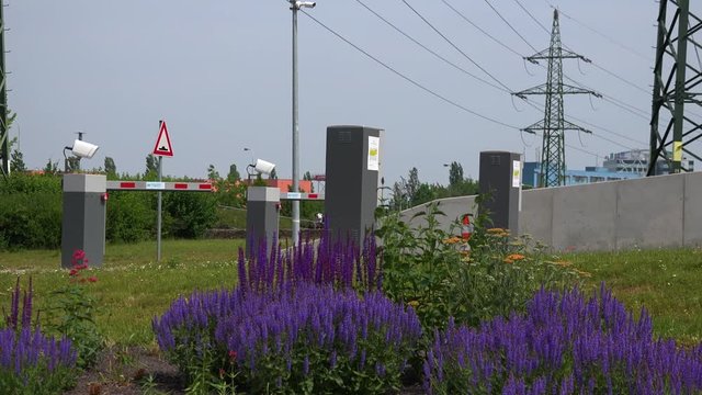 Closed crossing barriers on a driveway