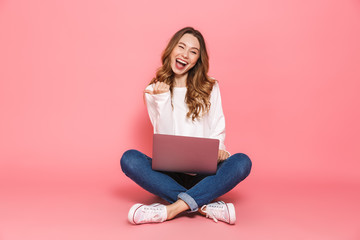 Portrait of an excited young woman