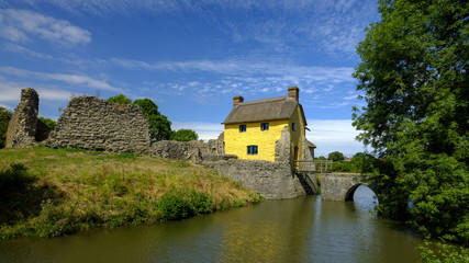 Fototapeta na wymiar Stogursey Castle, a 10th Century Moat and Bailey now a Landmark Trust property near Bridgewater, Somerset, UK