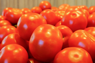 Tomatoes in the window of the market. Harvest this year.