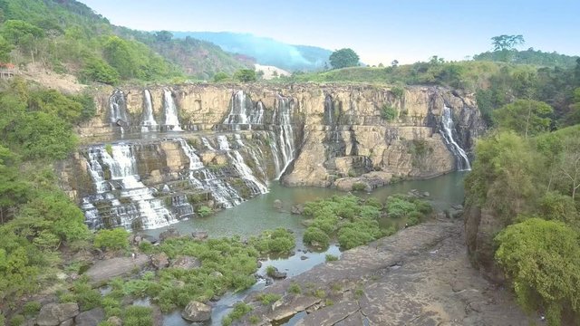 camera turns around Pongour waterfall among central highland