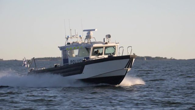 Slow motion footage of a new boat for Finnish police department in full action.