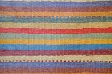 Colorful traditional Peruvian style, close-up rug surface.