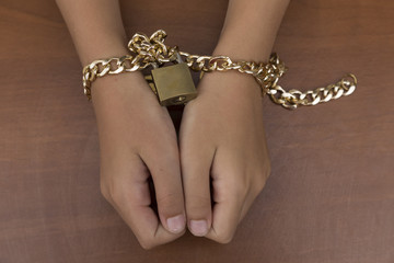  A fearful child. End to violence against child.Stop abusing violence. chain-bound child. do not...