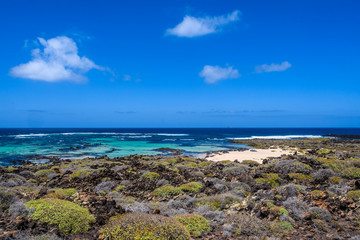 Rocky beach in Caletón Blanco in Lanzarote, Spain
