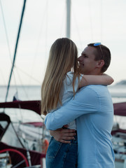 Boyfriend and girlfriend lovingly embrace each other