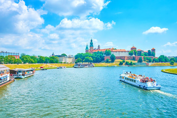 The tourist boat in Krakow, Poland - obrazy, fototapety, plakaty