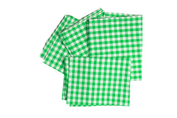 Set of four green and white checkered napkin isolated on white background.