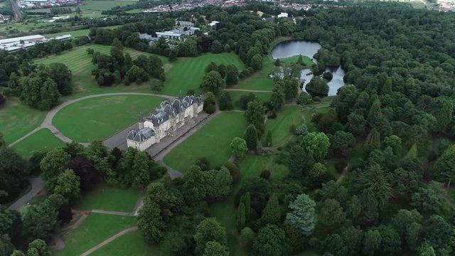 Aerial footage of Callendar House and Callendar Park in the town of Falkirk, Scotland.