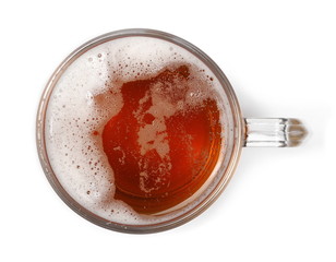 Mug of beer with bubble on glass isolated on white, top view