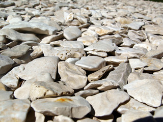 Beach with white stones instead of sand in mediterranean Croatia