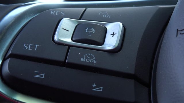 Closeup on a Adaptive Cruise Control system in a car