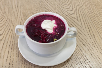 Tasty borsch - soup of beetroot with sour cream.