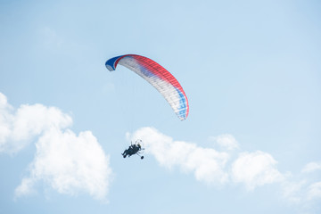 Paragliding in mountains. Para gliders in fight in the mountains, extreme sport activity.