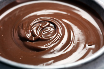 Melting chocolate, melted delicious chocolate for praline icing confectionery