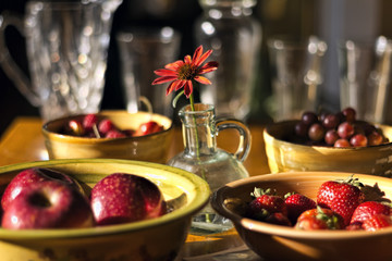 Red Fruit and Flower on Table