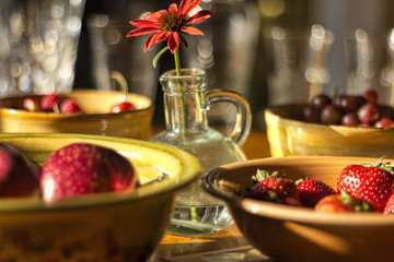 Red Fruit and Flower on Table